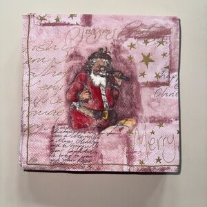 Pink holiday napkins featuring Santa making his naughty/nice list.